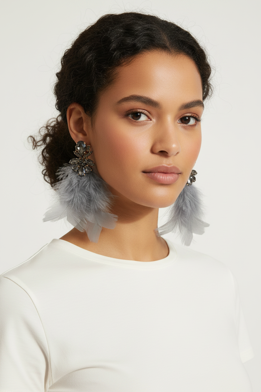 Boucles d'oreilles plumes grises et cristaux fumés