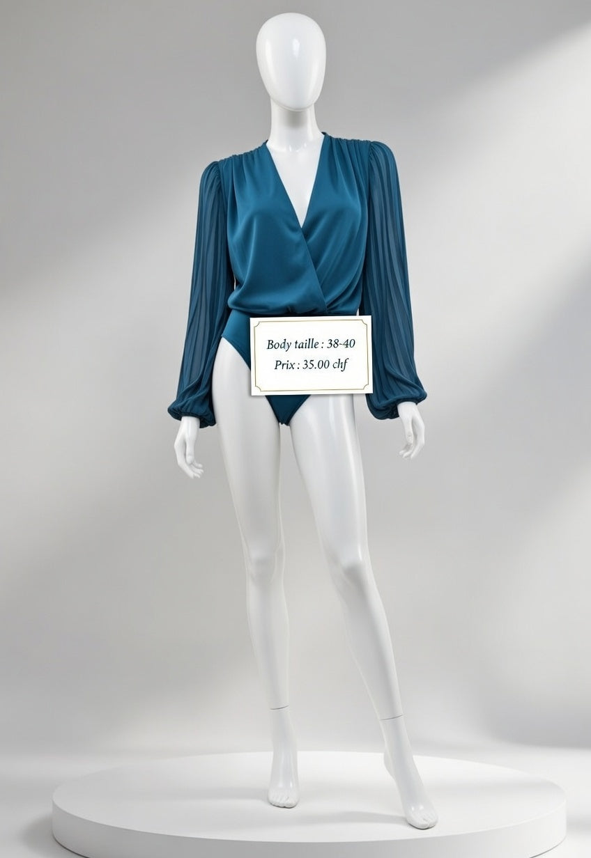 35,00 chf - Taille 38-40 - Body Décolleté V Turquoise – Manches Bouffantes Sophistiquées !